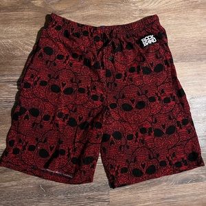 red skull rock band shorts